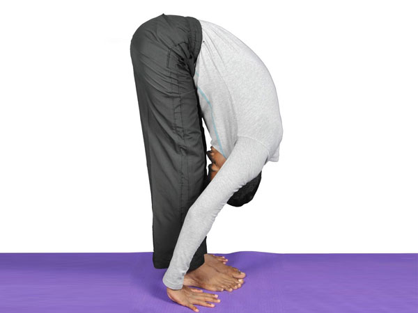 6. ಪಾದ ಹಸ್ತಾಸನ (Standing forward bend)
